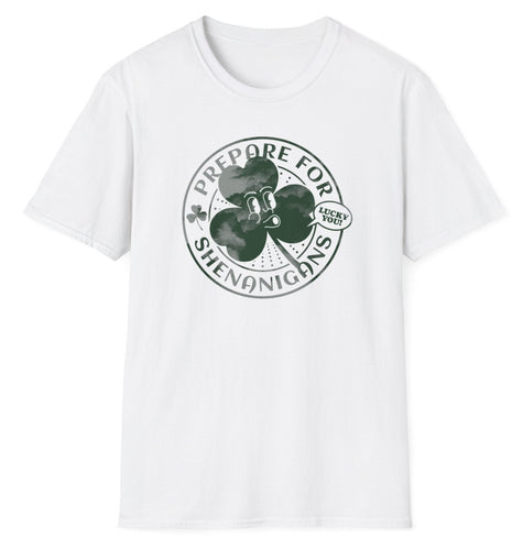 A white t shirt that reads Shenanigans over the top of a green shamrock. These original graphic tees are made of soft materials and 100% cotton.